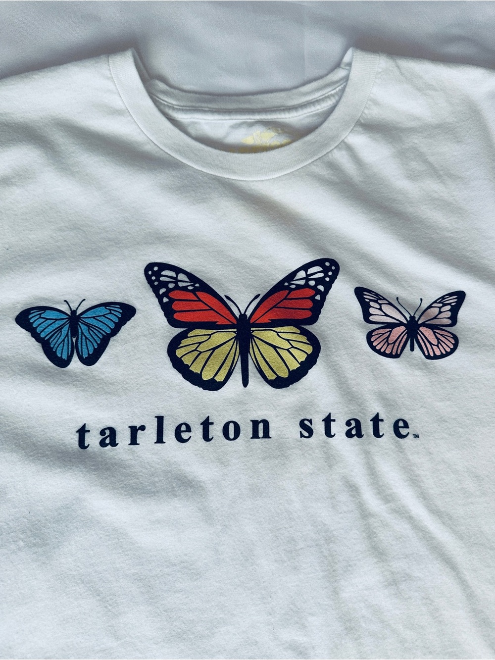 Tarleton State U Tshirt white with butterflies size L
